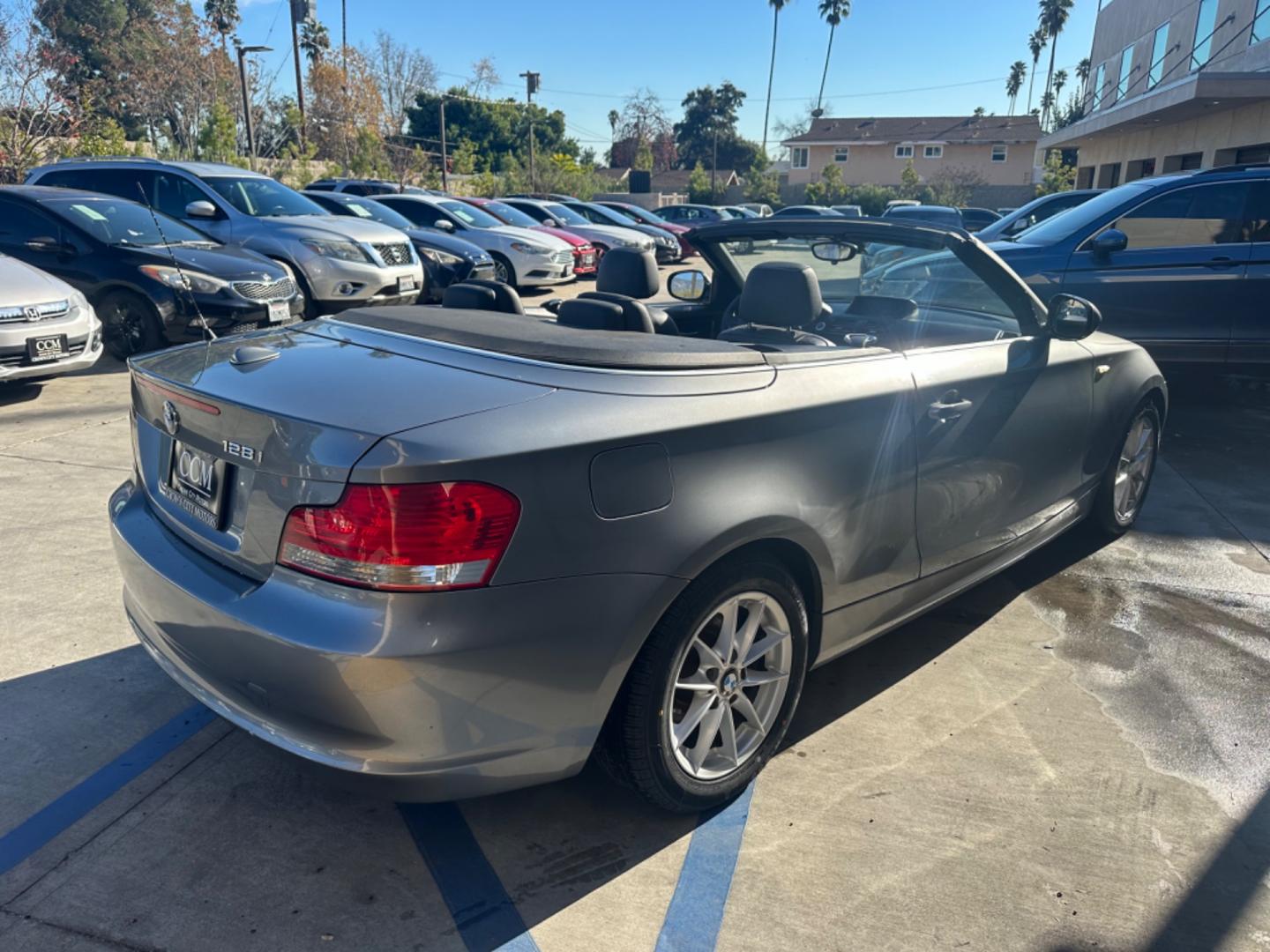 2011 Gray /Black BMW 1-Series 128i Convertible (WBAUN1C52BV) with an 3.0L L6 DOHC 24V engine, Automatic transmission, located at 30 S. Berkeley Avenue, Pasadena, CA, 91107, (626) 248-7567, 34.145447, -118.109398 - Low Miles!!! Elevate your driving experience with our 2011 BMW 1-Series 128i Convertible, now featured at our Buy Here Pay Here (BHPH) dealership in Pasadena, CA. Ideal for enthusiasts in Altadena CA, Glendale CA, Los Angeles CA, and throughout LA County, this stunning pre-owned convertible combine - Photo#10